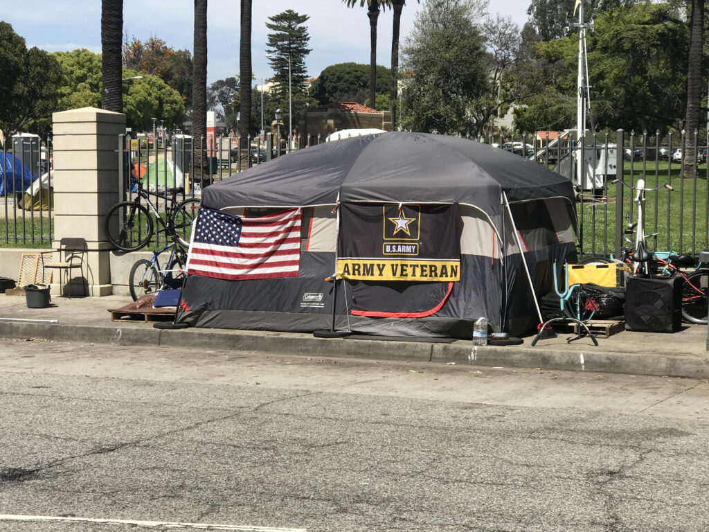 A makeshift shelter on streets as a sleeping area for a homeless veteran